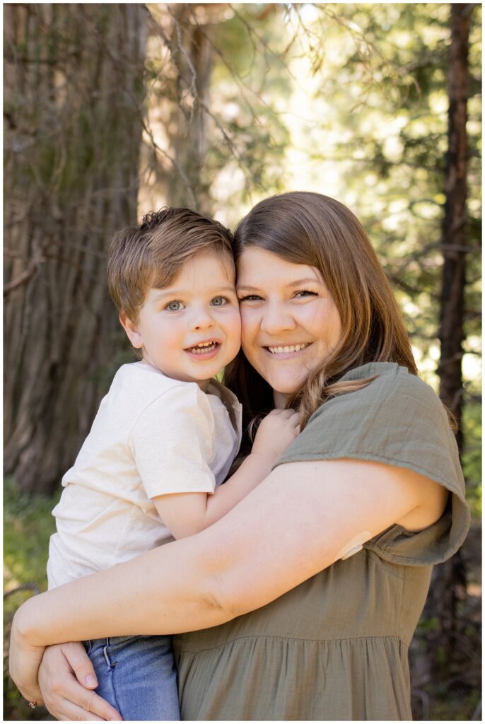 Madison holding Theo in Cedarpines Park